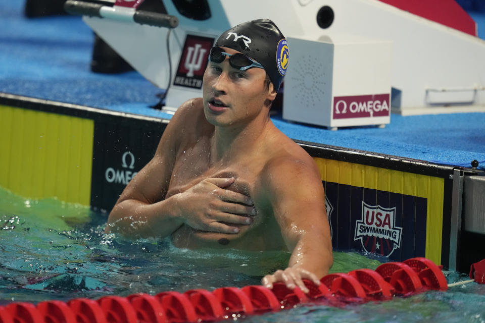 Justin Ress celebrates after winning the men's 50-meter backstroke at the U.S. nationals swimming meet in Indianapolis, Thursday, June 29, 2023. (AP Photo/Michael Conroy)