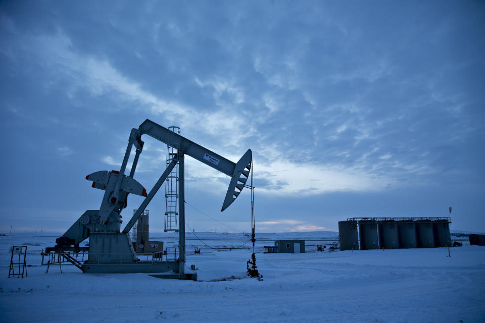 A pumpjack operates above an oil well in the Bakken Formation outside Williston, North Dakota, U.S., on Friday, March 9, 2018 (Photo: Bloomberg via Getty Images)