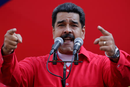 President Nicolas Maduro speaks during a pro-government rally at Miraflores Palace in Caracas, Venezuela October 25, 2016. REUTERS/Carlos Garcia Rawlins