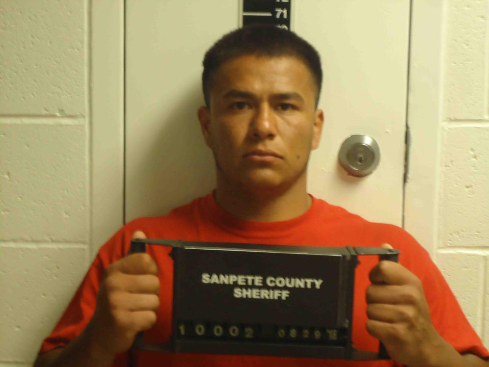 This photo provided by the Sanpete County Jail in Manti, Utah, shows Ruben Hernandez. Prosecutors say Hernandez, an Idaho prison inmate sent to help fight a wildfire, raped a woman who was also working to support firefighters in Utah. Sanpete County Attorney Kevin Daniels said Tuesday, Sept. 4, 2018, the woman had rejected several advances from Hernandez before the Aug. 29 assault. Hernandez was charged with felony rape. (Sanpete County Jail via AP)