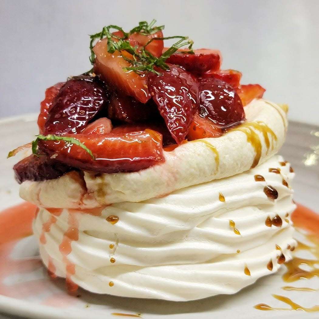 Pastry chef Gerald Hawkins Jr. created this Strawberry Pavlova with fruit from Carol Sue Farms, Nilla Wafer Créme Fraiche and Balsamic Gastrique for Beach Shop and Grill restaurant in Topsail Beach