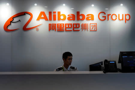 The logo of Alibaba Group is seen inside DingTalk office, an offshoot of Alibaba Group Holding Ltd, in Hangzhou, Zhejiang province, China July 20, 2018. Picture taken July 20, 2018. REUTERS/Aly Song
