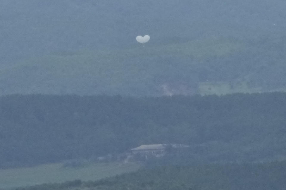Balloons are seen from the Unification Observation Post in Paju, South Korea, near the border with North Korea, South Korea, Wednesday, July 24, 2024. (AP Photo/Ahn Young-joon)
