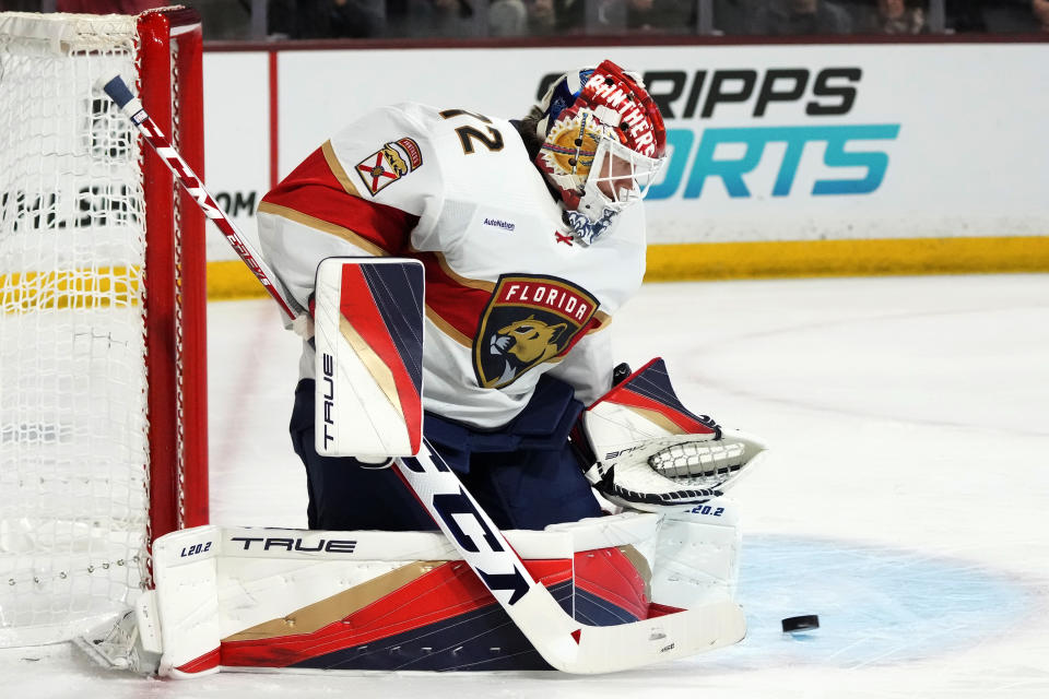 Florida Panthers goaltender Sergei Bobrovsky makes a save on a shot against the Arizona Coyotes during the first period of an NHL hockey game Tuesday, Jan. 2, 2024, in Tempe, Ariz. (AP Photo/Ross D. Franklin)