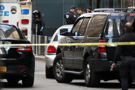 A member of the New York Police Department bomb squad is pictured outside the Time Warner Center in the Manahattan borough of New York City after a suspicious package was found inside the CNN Headquarters in New York, U.S., October 24, 2018. REUTERS/Kevin Coombs