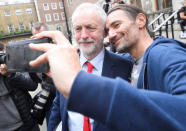 Britain's opposition Labour Party's leader Jeremy Corbyn stops for a selfie as he leaves after giving a speech in central London, April 20, 2017. REUTERS/Toby Melville