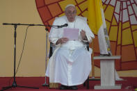 Pope Francis delivers his speech as he meets authorities, civil society and diplomatic corps in the garden of the "Palais de la Nation" in Kinshasa, Democratic Republic of the Congo, Tuesday, Jan. 31, 2023. Pope Francis starts his six-day pastoral visit to Congo and South Sudan where he'll bring a message of peace to countries riven by poverty and conflict. (AP Photo/Gregorio Borgia)