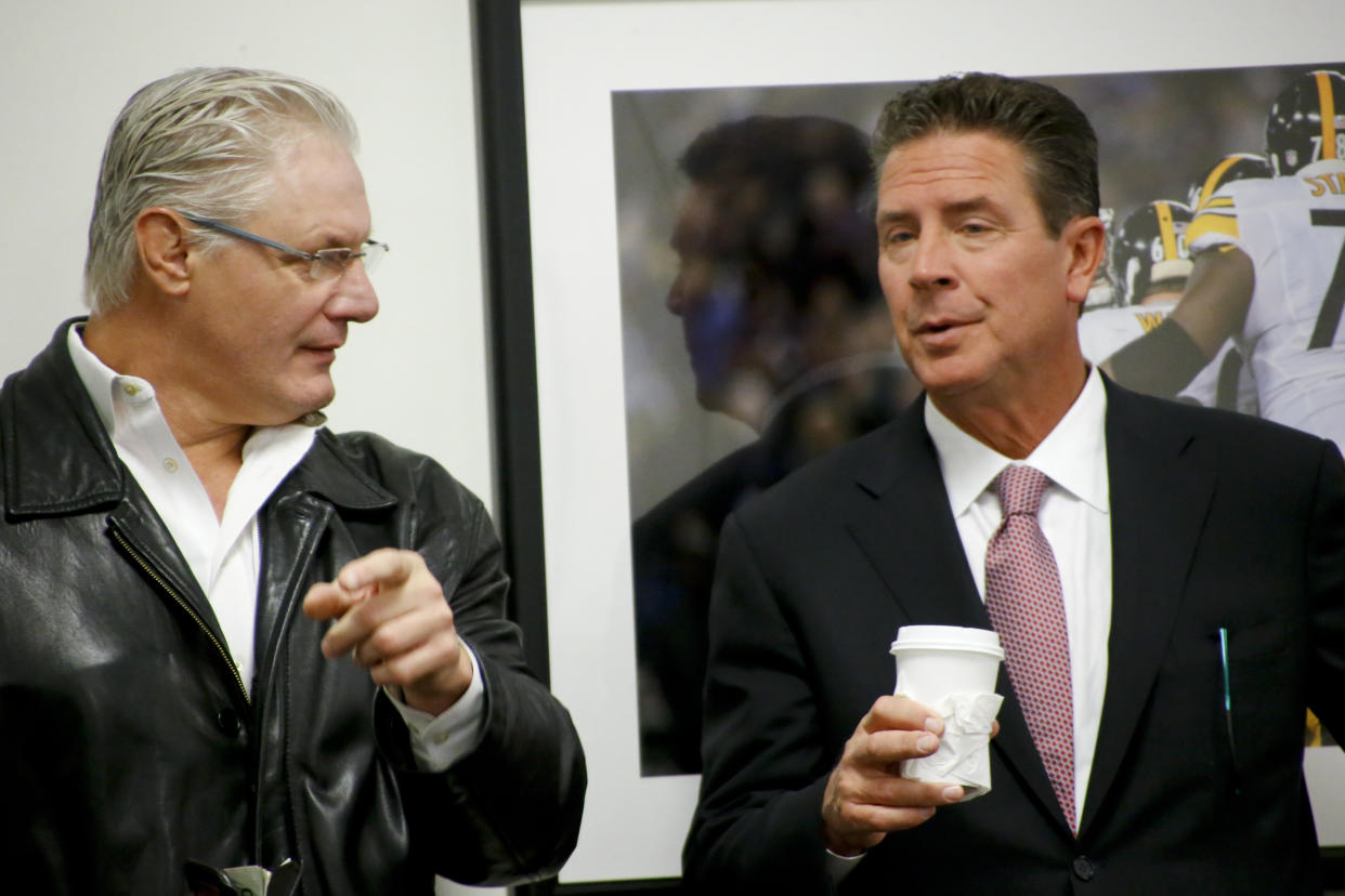 Former Pittsburgh lineman Bill Fralic, left, and NFL Hall of Fame member, Pitt quarterback Dan Marino chat at a news conference in 2015. Fralic finished in the top 10 of the Heisman voting on two occasions. AP Photo/Keith Srakocic)