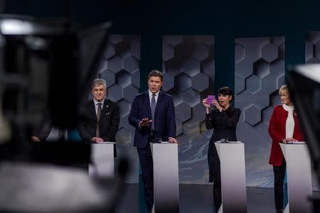 (L-R): Benedikt Johannesson of the Reform Party, Finance Minister and Independence Party leader Bjarni Benediktsson, Birgitta Jonsdottir of the Pirate Party and Oddny G. Hardardottir of the Social Democratic Alliance take part in a debate ahead of parliamentary elections in Iceland, October 28, 2016 .REUTERS/Geirix