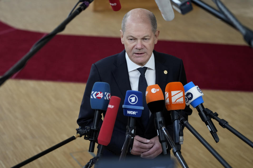 Germany's Chancellor Olaf Scholz speaks with the media as he arrives for an EU summit at the European Council building in Brussels Brussels on Thursday, Feb. 9, 2023. European Union leaders are meeting for an EU summit to discuss Ukraine and migration. (AP Photo/Virginia Mayo)