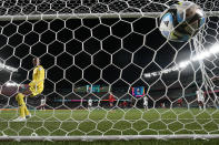 Zambia's goalkeeper Eunice Sakala gives up a goal to Spain's Jennifer Hermoso during the first half of the FIFA Women's World Cup Group C soccer match Spain and Zambia at Eden Park in Auckland, New Zealand, Wednesday, July 26, 2023. (AP Photo/Abbie Parr)