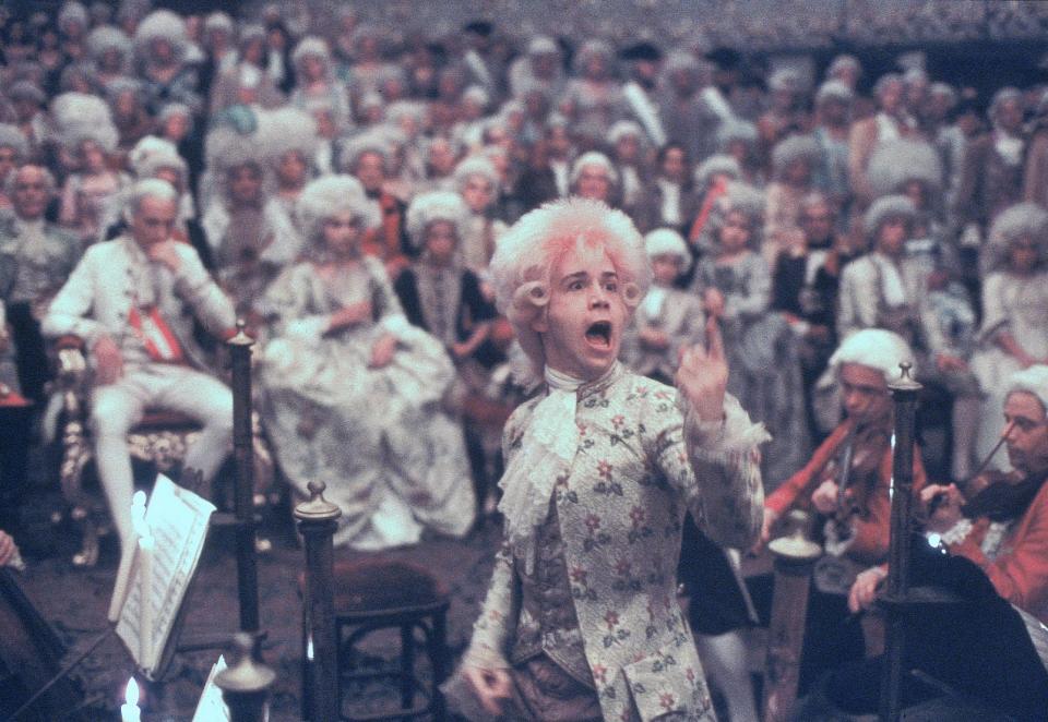 Tom Hulce (center) stars as the enigmatic musical genius Mozart in "Amadeus."