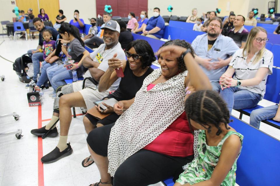 Families at Bernard Black Elementary School. Third graders at the school were surprised in spring 2022 with college scholarships courtesy of the Rosztoczy Foundation.