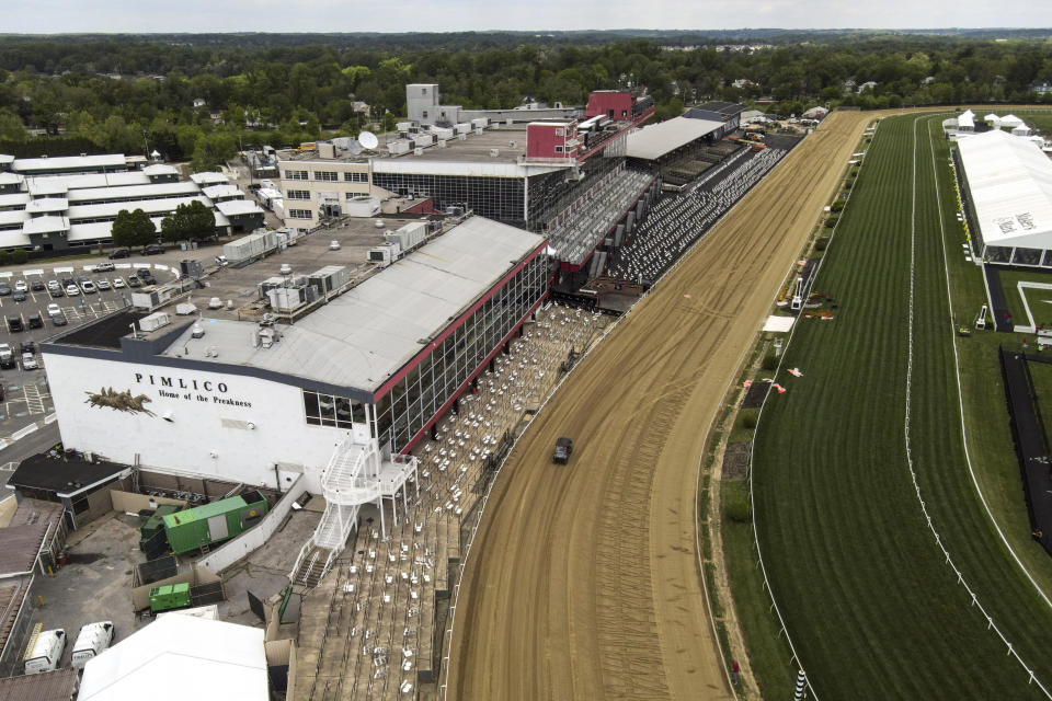 The first turn is seen at Pimlico Race Course ahead of the Preakness Stakes horse race, Tuesday, May 11, 2021, in Baltimore. (AP Photo/Julio Cortez)