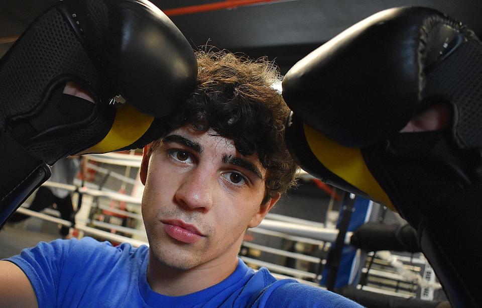 Boxer Michael Gaudreau trains with his dad Michael Gaudreau.