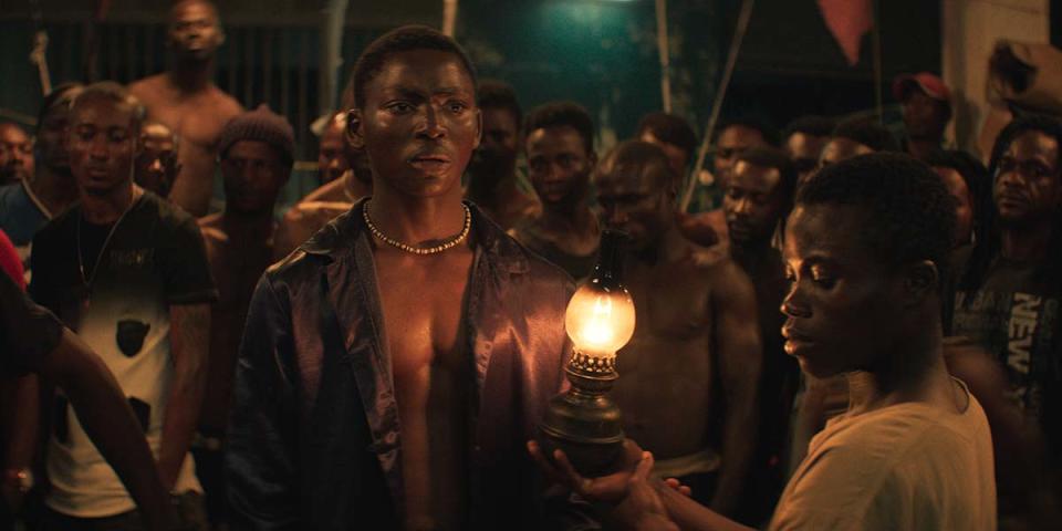 Koné Bakary (center) stars as a jailed pickpocket forced into being a storyteller in a prison run by its inmates in the drama "Night of the Kings."