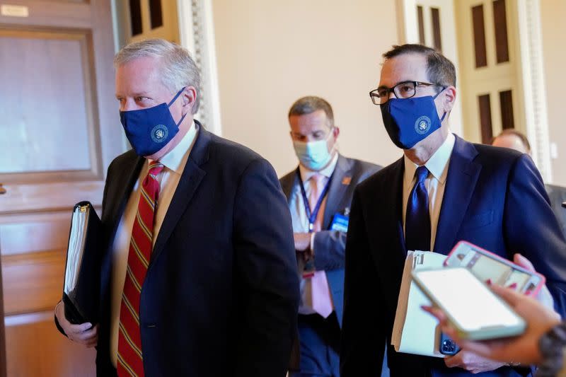 White House Chief of Staff Meadows and U.S. Treasury Secretary Mnuchin walk together in the U.S. Capitol in Washington