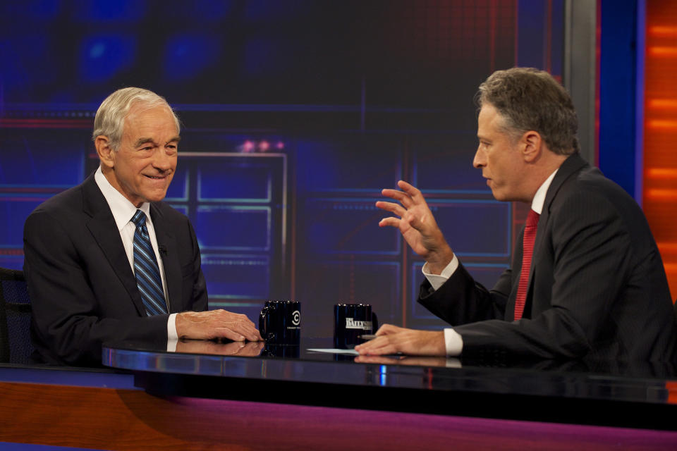 In this photo released by PictureGroup, host Jon Stewart and Republican presidential candidate, U.S. Rep. Ron Paul of Texas, appear on set during Comedy Central's "The Daily Show with Jon Stewart" on Wednesday, Sept. 26, 2011 in New York City. (AP Photo/PictureGroup, Ronald Smits)