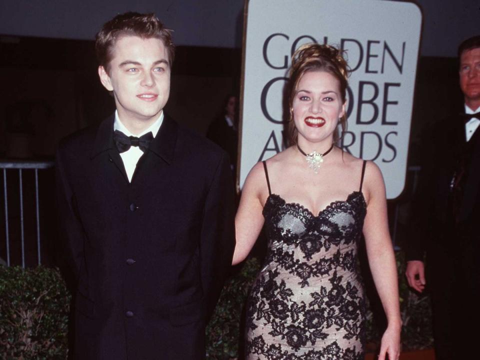 ‘Titanic’ stars Leonardo DiCaprio and Kate Winslet attend Golden Globe Awards at the Beverly Hilton on 18 January 1998 (Getty Images)