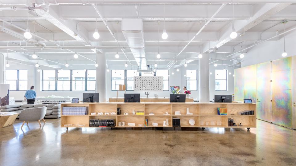 The reception desk features a clock by Stockholm-based art studio, Humans of 1982. The Brick sofa, a KiBiSi design, can also be found in the BIG offices in Copenhagen and London.