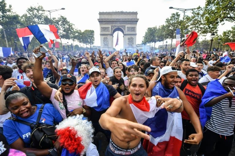 Massive crowds gathered on the Champs Elysees in Paris to celebrate