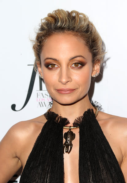 <p>Does Nicole Richie ever age? Her new short locks make her look younger than ever. [Photo: Getty] </p>