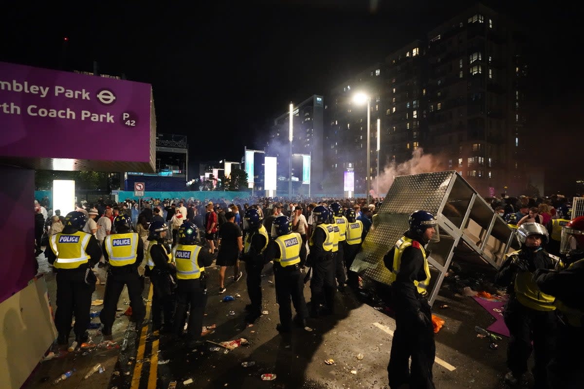 England fans and police at Wembley during the England v Italy final in 2020.   (PA Archive)