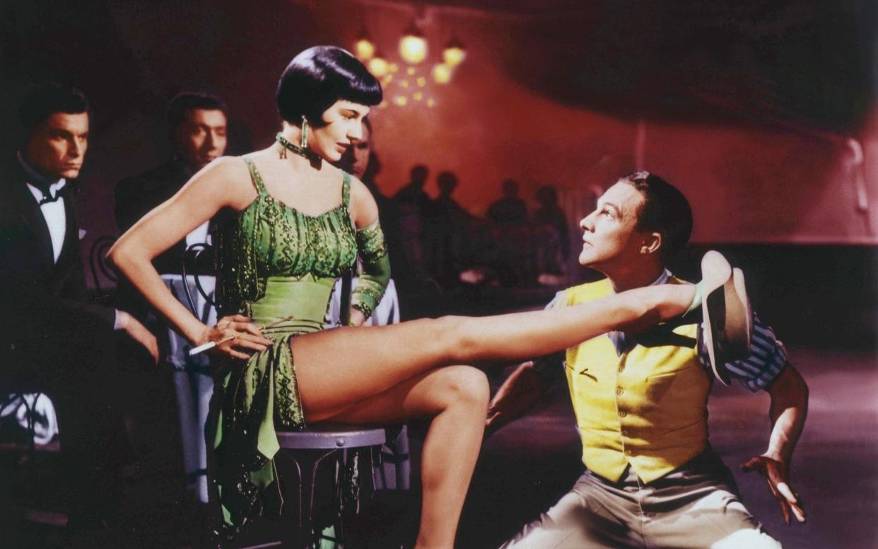 Cyd Charisse and Gene Kelly in Singin' in the Rain - Corbis Historical