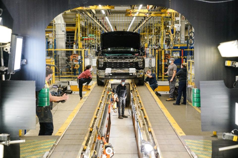 The first pickup trucks coming down the assembly line at Oshawa Assembly in Ontario on November 10, 2021.