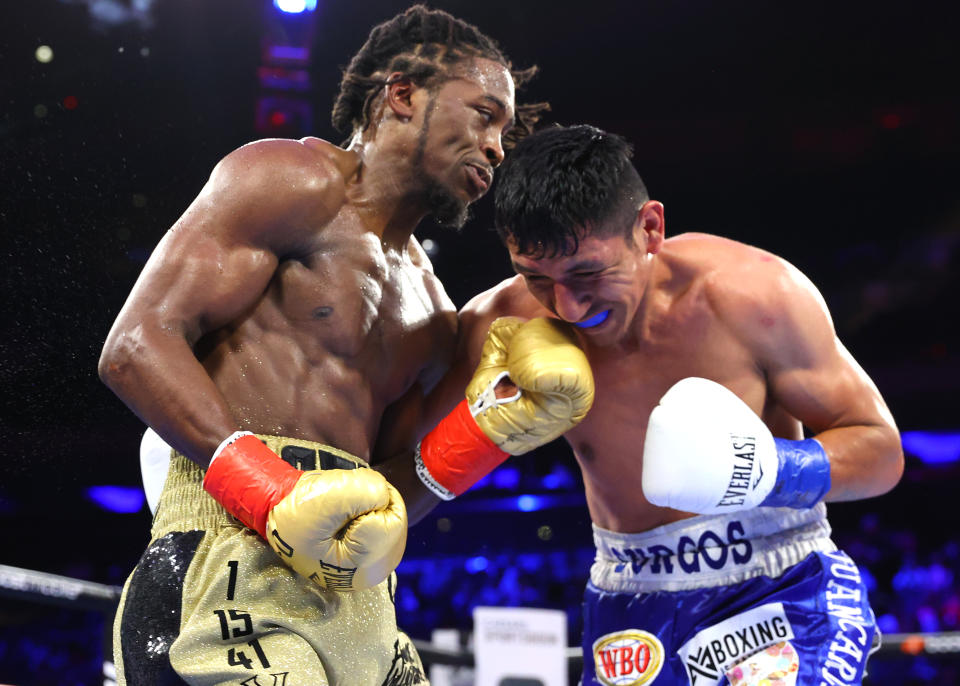 Keyshawn Davis (left) is a well-rounded fighter and an easy choice as the 2022 Yahoo Sports male Prospect of the Year in boxing. (Photo by Mikey Williams/Top Rank Inc via Getty Images)