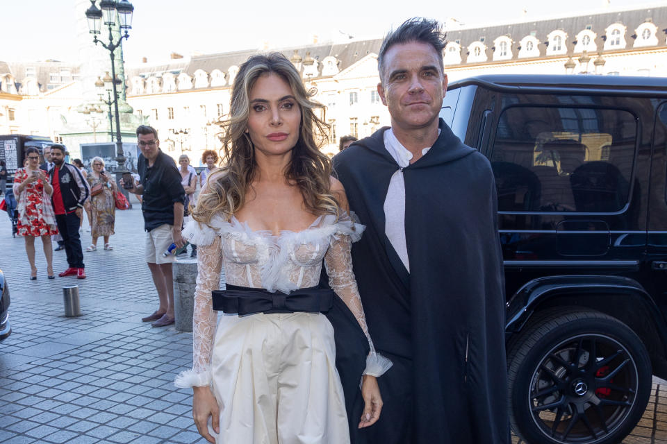 Ayda Field looks glamorous in white dress as she joins husband Robbie Williams 