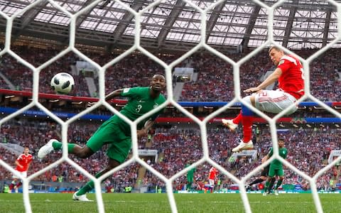 Dzyuba steers in Russia's third with his first touch - Credit: Kevin C. Cox/Getty Images