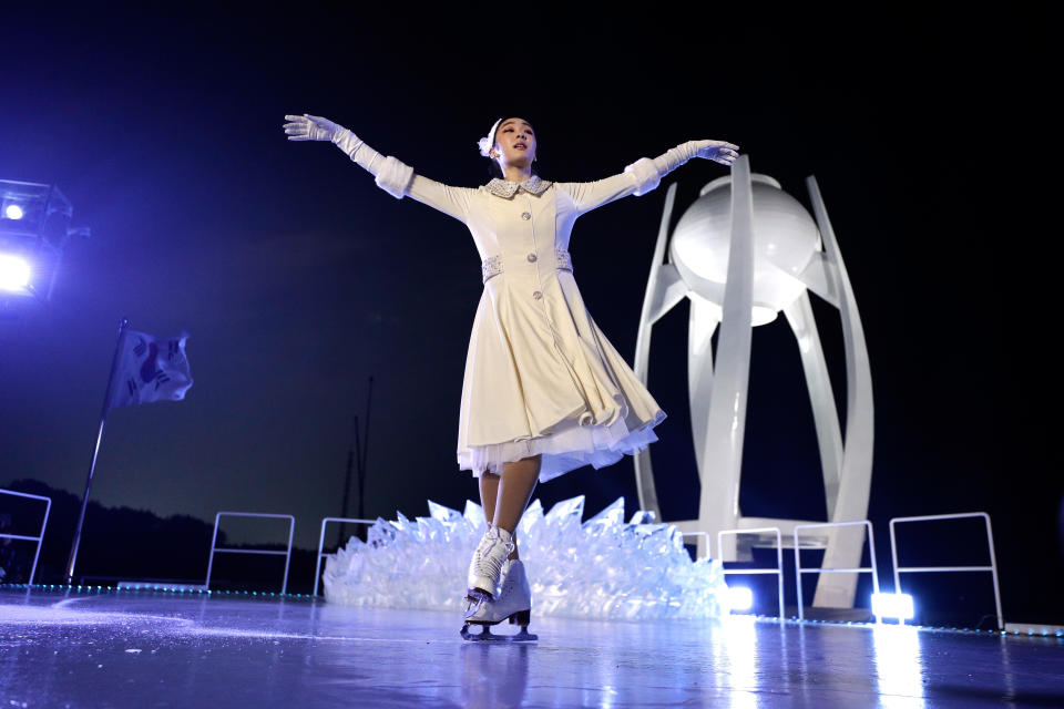 <p>Kim Yu-na, South Korean Figure Skater prepares to light the cauldron during the Opening Ceremony of the PyeongChang 2018 Winter Olympic Games at PyeongChang Olympic Stadium on February 9, 2018 in Pyeongchang-gun, South Korea. (Photo by Pool – David J. Phillip/Getty Images) </p>