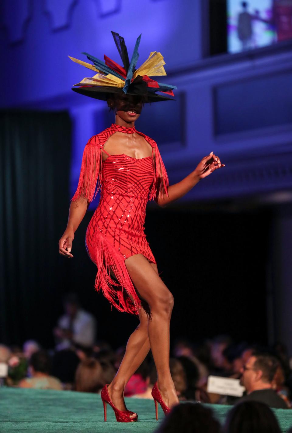 Model Cassie Engelking shows a Derby look at the 2022 Kentucky Derby Festival/Macy's Spring Fashion Show. Contributing sponsors are Guess ? Inc., Caesars Southern Indiana, J Michael's Spa & Salon and Radley London. March 31, 2022