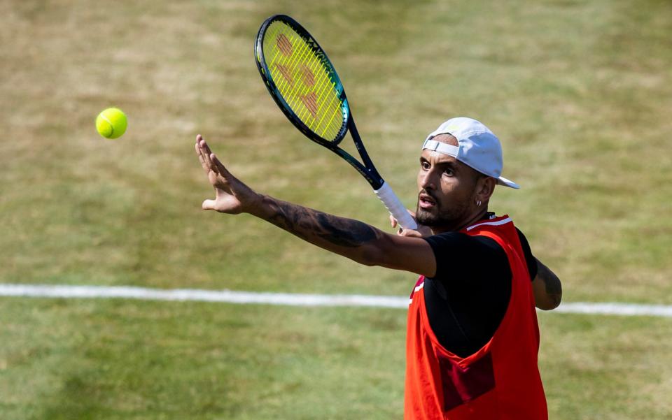 Nick Kyrgios serves to Andy Murray - Tom Weller/dpa via AP