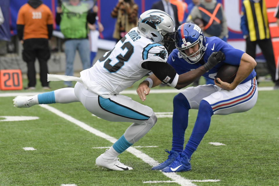 Carolina Panthers defensive end Brian Burns (53) sacks New York Giants quarterback Daniel Jones (8) during the second half of an NFL football game, Sunday, Oct. 24, 2021, in East Rutherford, N.J. (AP Photo/Bill Kostroun)