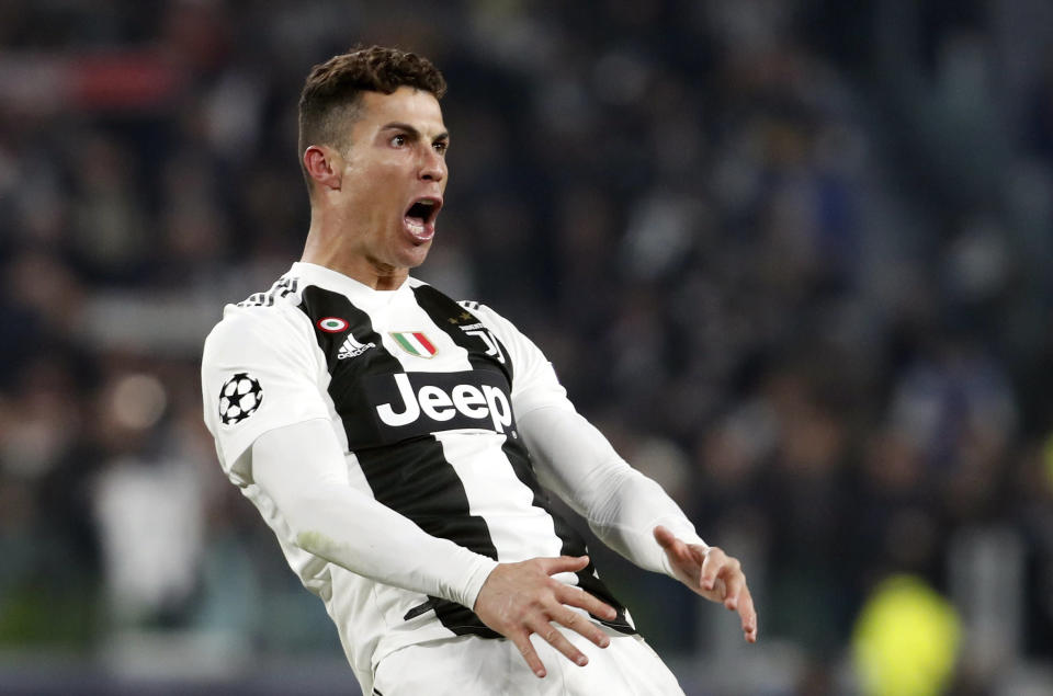 Juventus' Cristiano Ronaldo celebrates after scoring his side's third goal during the Champions League round of 16, 2nd leg, soccer match between Juventus and Atletico Madrid at the Allianz stadium in Turin, Italy, Tuesday, March 12, 2019. (AP Photo/Antonio Calanni)