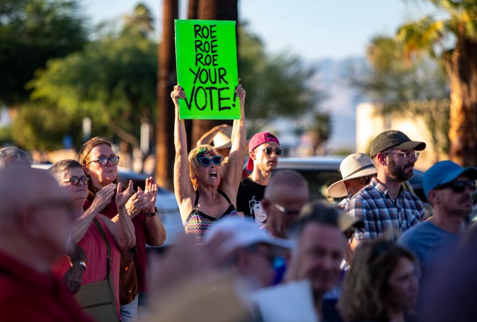 Lauri Svedberg of Palm Springs holds up her sign and shouts in support of a speaker during an abortion rights rally organized by Courageous Resistance of the Desert in front of the Palm Springs Courthouse in Palm Springs, Calif., Friday, June 24, 2022. 