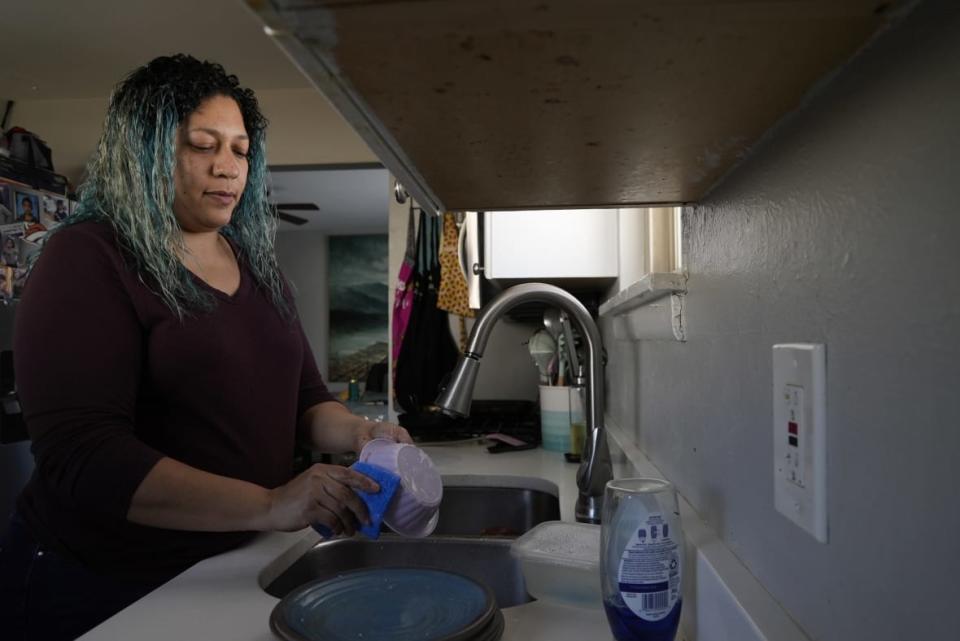 Betty Rivas of Commerce City, Colorado, says she was startled to learn this year that her child’s school had fountains with unsafe drinking water. Advocates are urging Washington to do more to eliminate such hazards. (Photo by Brittany Peterson / AP)