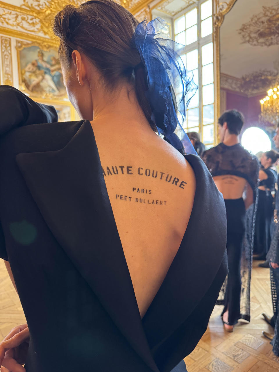 A model backstage at the Peet Dullaert Paris Fashion Week SS24 show.