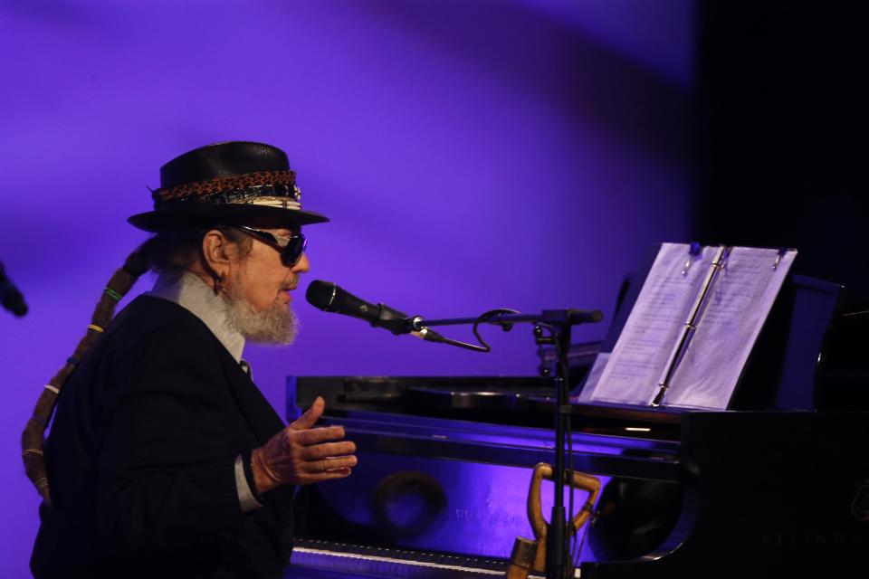 FILE - In this Nov. 20, 2015. file photo, Dr. John performs during a funeral tribute to Allen Toussaint in New Orleans. The family of the Louisiana-born musician known as Dr. John says the celebrated singer and piano player who blended black and white musical influence with a hoodoo-infused stage persona and gravelly bayou drawl, has died. He was 77. A family statement released by his publicist says Dr. John, who was born Mac Rebennack, died early Thursday of a heart attack. (AP Photo/Gerald Herbert, File)