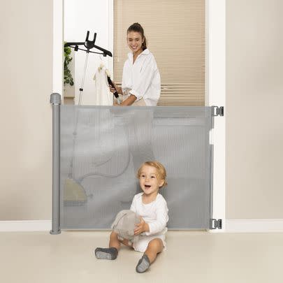 Have you got kids or pets running about the house? Get 15% off this retractable stair gate