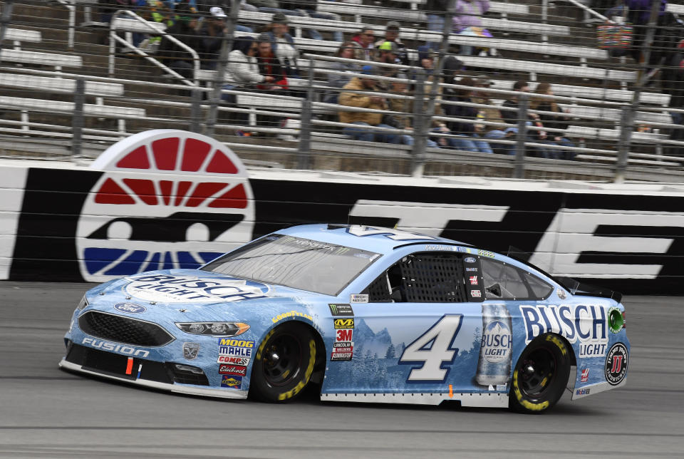 Kevin Harvick (4) comes out of Turn 4 during a NASCAR Cup Series auto race in Fort Worth, Texas, Sunday, April 8, 2018. (AP Photo/Larry Papke)