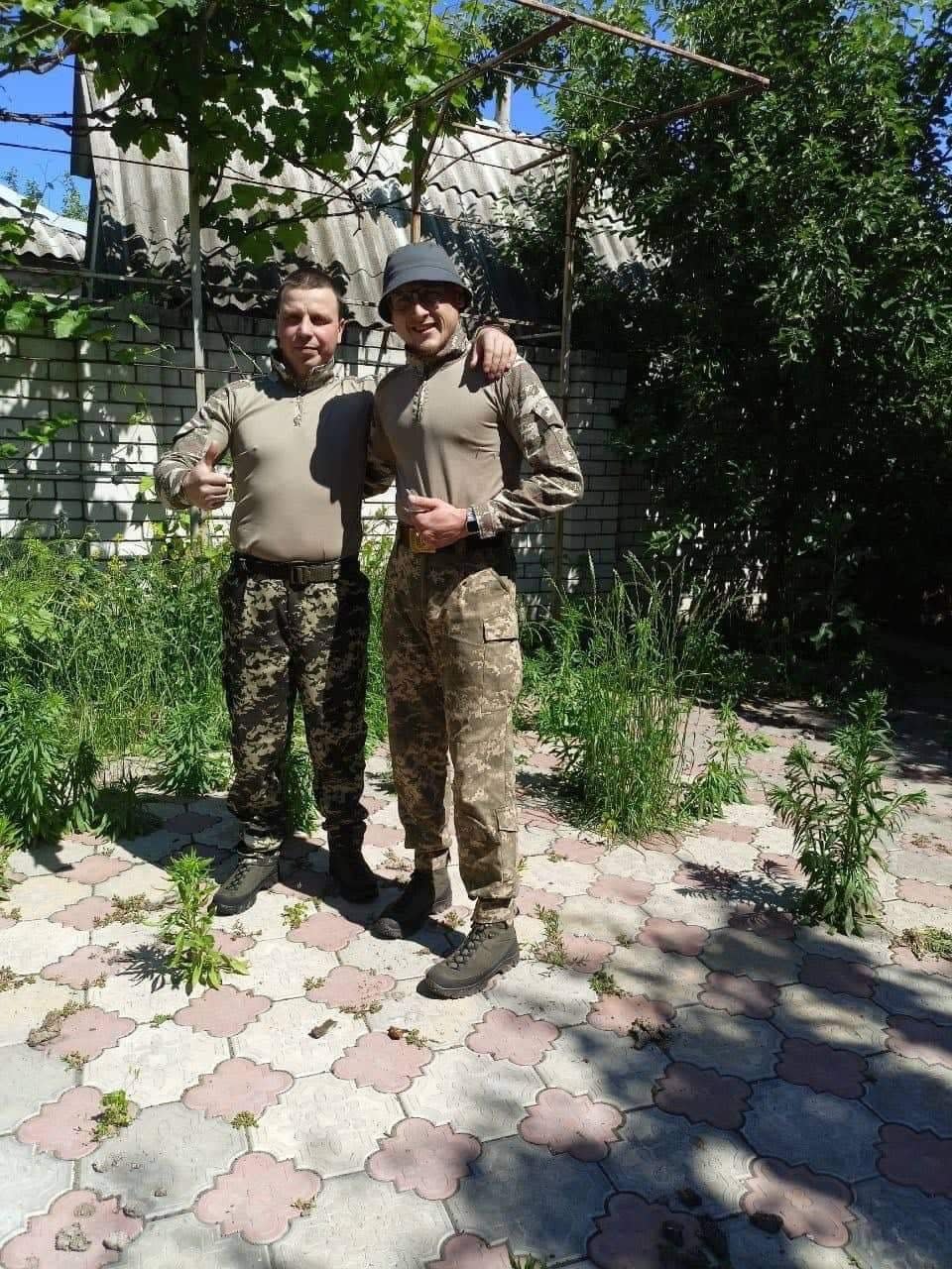 Military recipients of Ikos combat boots stand for a picture somewhere near Kherson, Ukraine. The picture was received in mid-June 2022 by a Slater woman who's been sending money to Ikos, a Ukrainian shoe company where a friend works, which has been working to supply Ukrainian forces fighting against Russia's invasion.