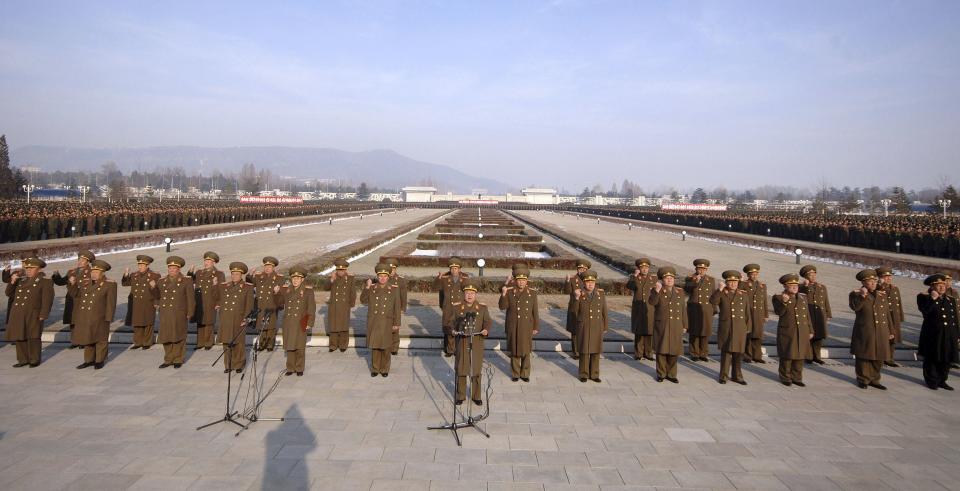 North Korean People's Army soldiers take part in a rally to swear allegiance to North Korean leader Kim Jong Un ahead of the second death anniversary of former leader Kim Jong Il at the Kumsusan Palace of the Sun