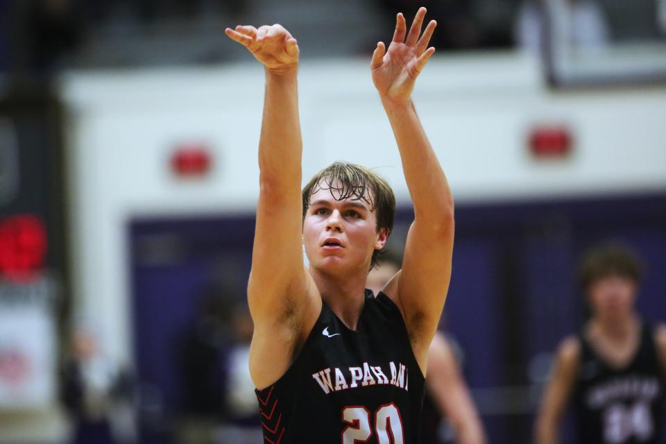 Wapahani boys basketball's Isaac Andrews (20) scored a game-high 28 points in the team's 60-51 win over Muncie Central at The Fieldhouse on Tuesday, Nov. 21, 2023.