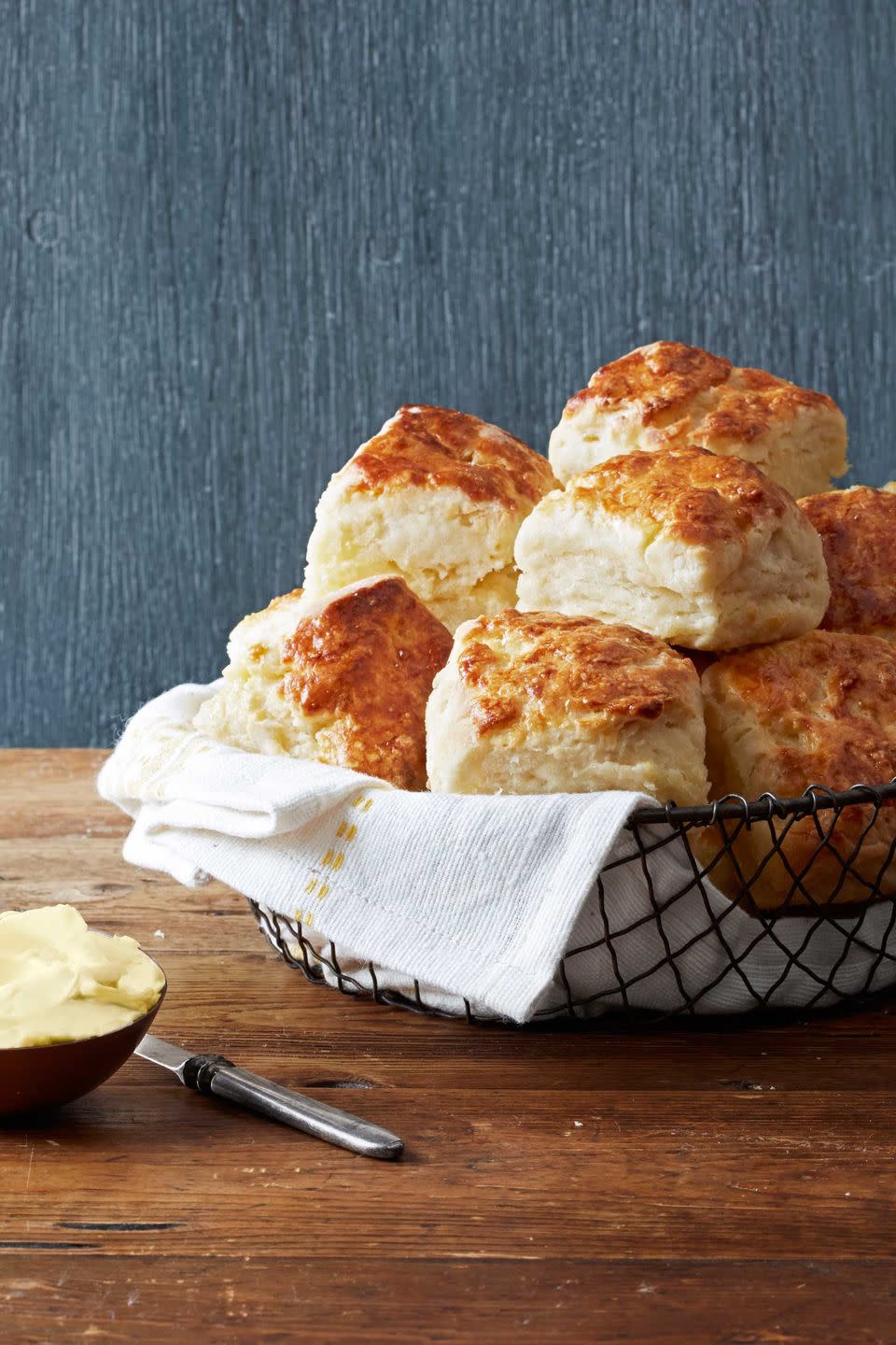 <p>Cream cheese is the surprise ingredient in these bite-size delights.</p><p><strong><a href="https://www.countryliving.com/food-drinks/recipes/a4673/buttermilk-biscuits-recipe-clx1113/" rel="nofollow noopener" target="_blank" data-ylk="slk:Get the recipe for Buttermilk Biscuits;elm:context_link;itc:0;sec:content-canvas" class="link ">Get the recipe for Buttermilk Biscuits</a>.</strong></p>