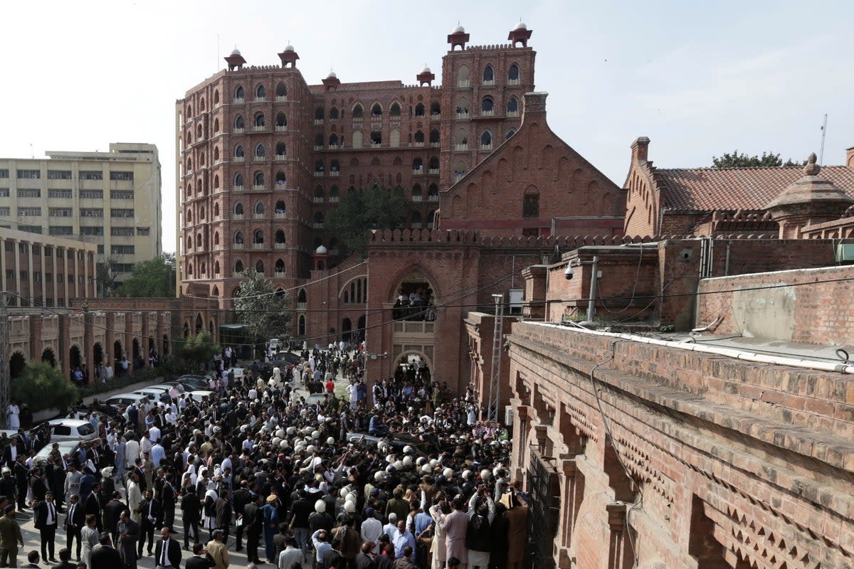 File photo: Former Pakistan prime minister Imran Khan arrives for an appearance at the Lahore High Court (EPA)