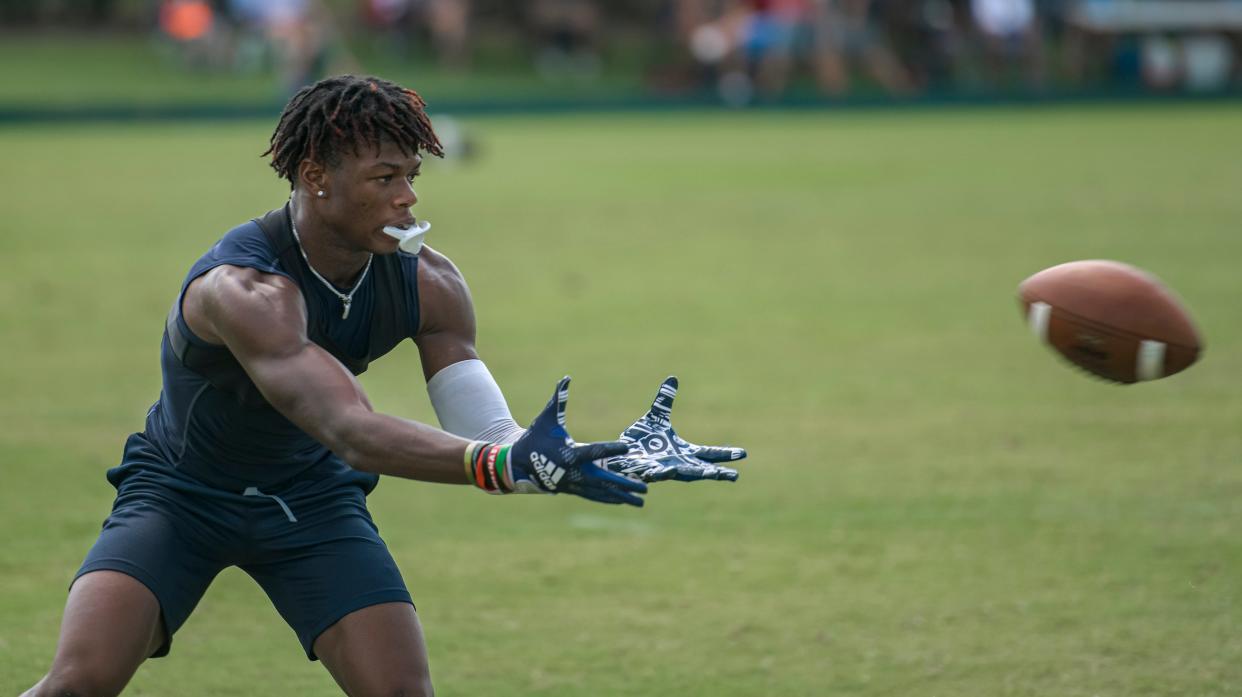 Steinbrenner High School Warriors’ Andrew Brinson catches a pass at the Florida High School 7v7 Association state championship in The Villages on Friday, June 24, 2022. [PAUL RYAN / CORRESPONDENT]