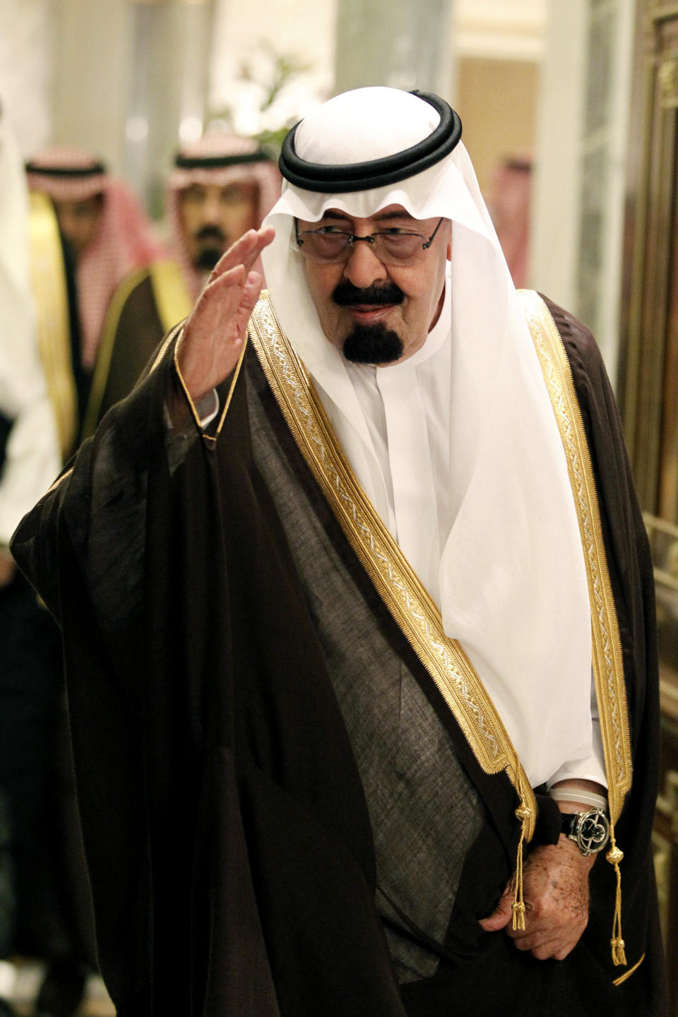 File - In this Tuesday, May 11, 2010 file photo, Saudi King Abdullah bin Abd al-Aziz, salutes as he arrives to the opening of the Gulf Cooperation Council (GCC) consultative summit in Riyadh, Saudi Arabia. Saudi Arabia, the United Arab Emirates and Bahrain said Wednesday, March 5, 2014 that they have recalled their ambassadors from the Gulf nation of Qatar over its alleged breach of a regional security deal in the clearest sign yet of the rift among Gulf Arab countries over Islamists in the region. Tensions have been brewing between Gulf countries and Qatar since Egyptians ousted President Hosni Mubarak and Qatar’s massive financial and public support for his successor, Islamist President Mohammed Morsi, stood at odds with the UAE and Saudi Arabia’s policies. (AP Photo/Hassan Ammar, File)